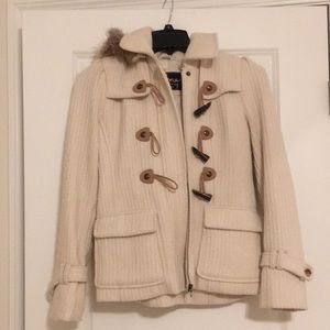 GUESS Size S cream colored winter coat with fur lined hood.